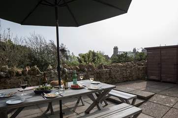 Sea air and the sound of the waves on the nearby beach, make dining al fresco a delight.