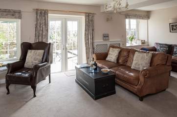 French doors lead to the front terrace.