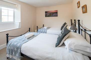 Bedroom 3 has twin 3' beds and looks out over Golden Cap.