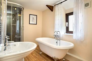 The main family bathroom has a fabulous free-standing bath.