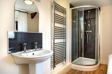 There is a separate shower in the family bathroom. There is also a wet-room on the ground floor.
