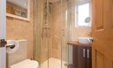 Enjoy a shower in the compact shower-room after a day on the nearby beach. - Thumbnail Image