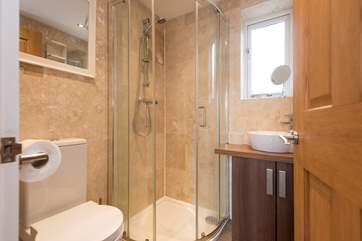 Enjoy a shower after a day on the beach nearby.