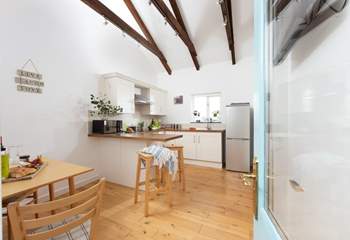 Downstairs, the open plan kitchen and dining area has everything you will need.