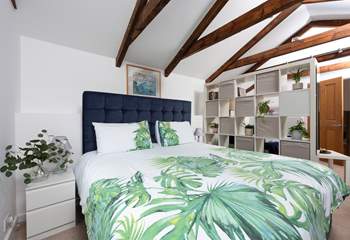 Step up into the open plan living and bedroom area with a luxurious super-king-bed which can be twins if you prefer. 