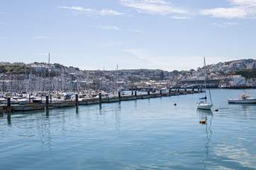 Marvel at the boats bobbing on the water in the beautiful marina.