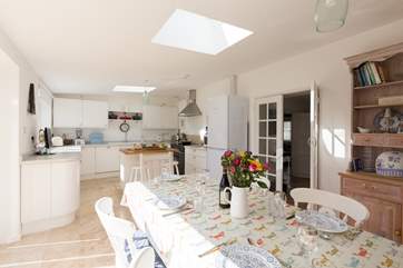 Looking along the full length of this sunny open plan space.
