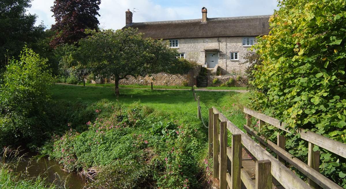 As well as the gardens around the farmhouse there is a small meadow and a little bridge over the river (please supervise children at all times).