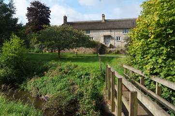 As well as the gardens around the farmhouse there is a small meadow and a little bridge over the river (please supervise children at all times).