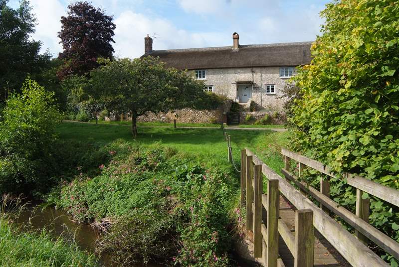 As well as the gardens around the farmhouse there is a small meadow and a little bridge over the river (please supervise children at all times).