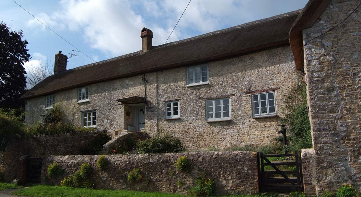 The farmhouse has an enclosed front garden and plenty of parking either to the side of the little no through lane or in the driveway to the side of the house.