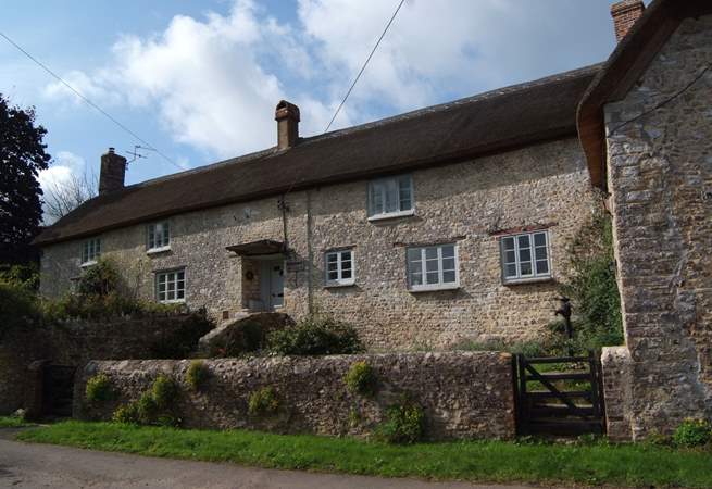 The farmhouse has an enclosed front garden and plenty of parking either to the side of the little no through lane or in the driveway to the side of the house.