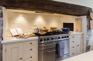There is a superb range cooker in the original inglenook fireplace.