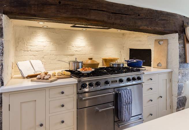 There is a superb range cooker in the original inglenook fireplace.