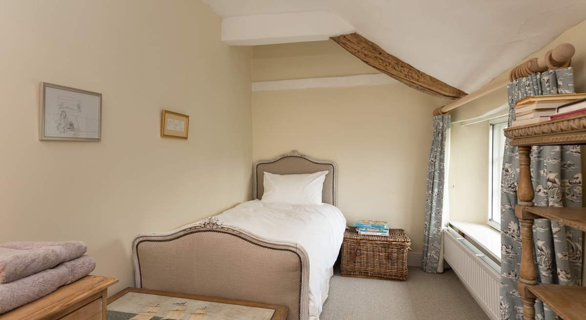 This lovely single bedroom looks out to the front of the farmhouse. The family bathroom is across the corridor.