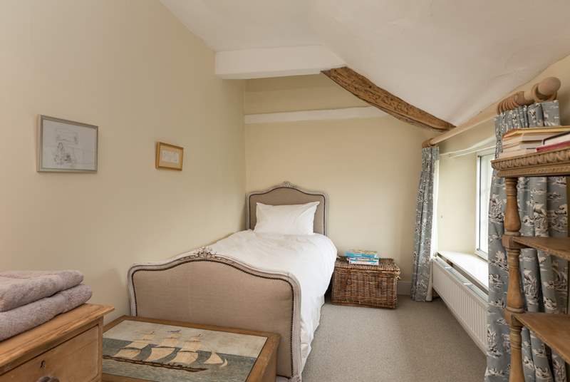 This lovely single bedroom looks out to the front of the farmhouse. The family bathroom is across the corridor.
