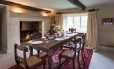 There is a 'formal' dining-room in one of the panelled reception rooms, complete with a huge inglenook fireplace and open fire. - Thumbnail Image