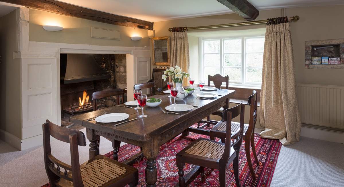 There is a 'formal' dining-room in one of the panelled reception rooms, complete with a huge inglenook fireplace and open fire.