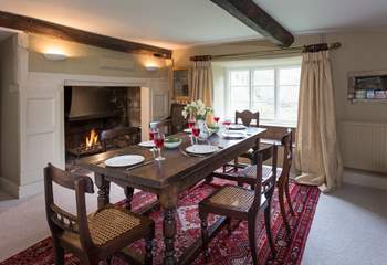 There is a 'formal' dining-room in one of the panelled reception rooms, complete with a huge inglenook fireplace and open fire.