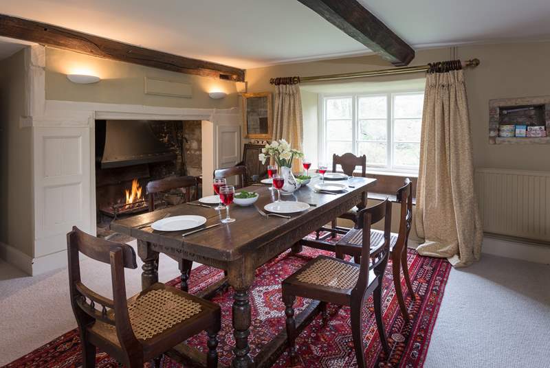 There is a 'formal' dining-room in one of the panelled reception rooms, complete with a huge inglenook fireplace and open fire.