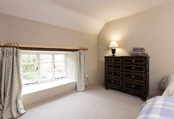 The outlook from this bedroom is at the near end of the farmhouse as you approach down the lane.