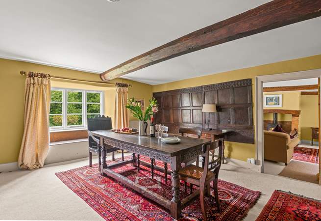 This dining-room still has its historic wooden panelling.