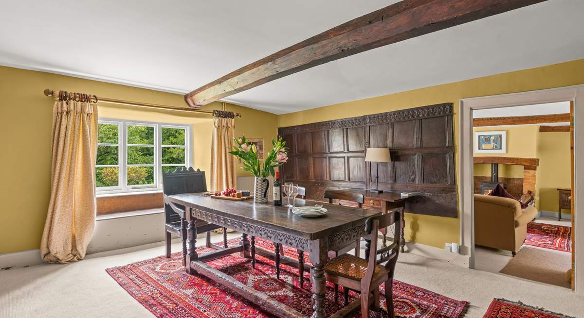 This dining-room still has its historic wooden panelling.