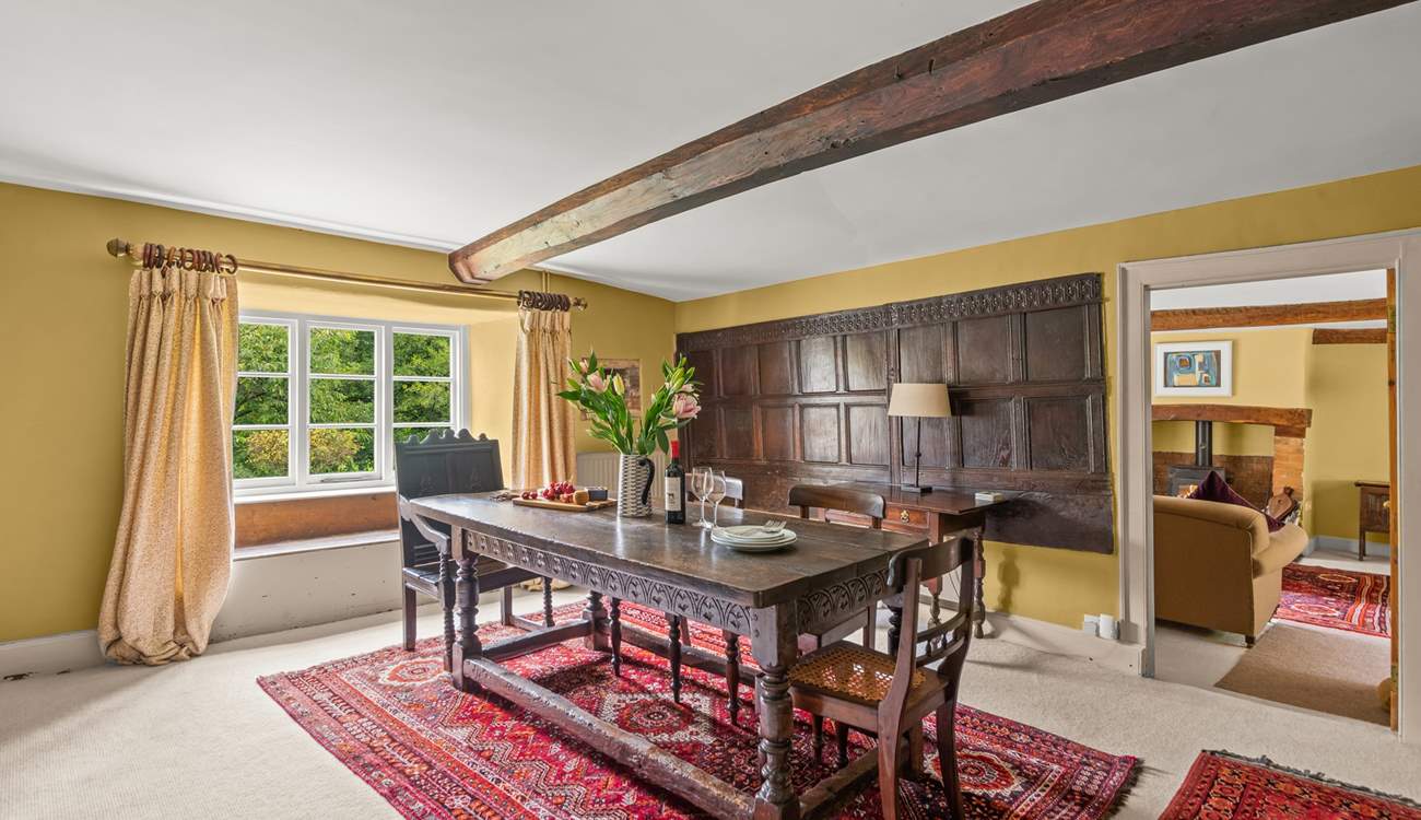 This dining-room still has its historic wooden panelling.