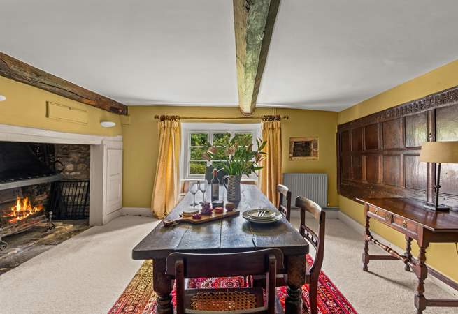 There is a 'formal' dining-room in one of the panelled reception rooms, complete with a huge inglenook fireplace and open fire.
