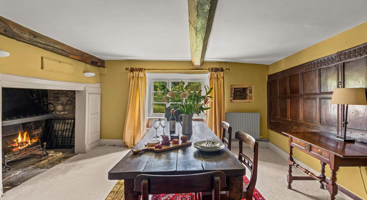 There is a 'formal' dining-room in one of the panelled reception rooms, complete with a huge inglenook fireplace and open fire.