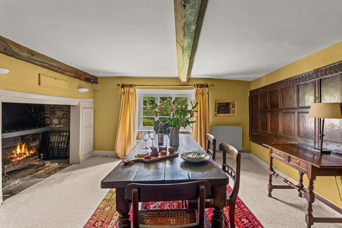There is a 'formal' dining-room in one of the panelled reception rooms, complete with a huge inglenook fireplace and open fire.