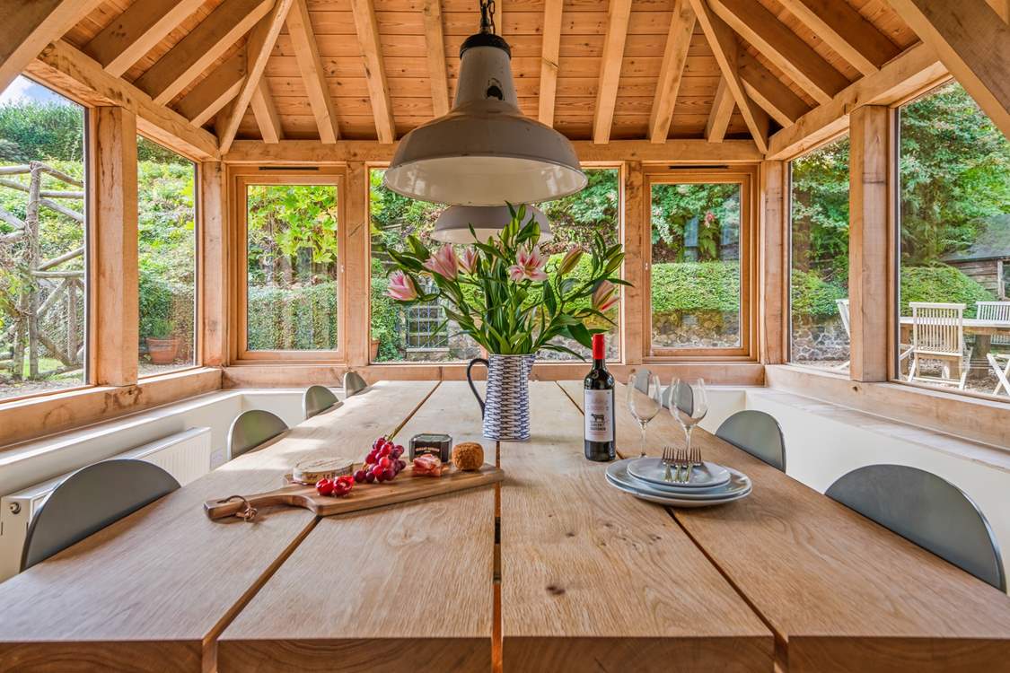 Eating in the garden-room is just as much fun, especially on a summer evening.