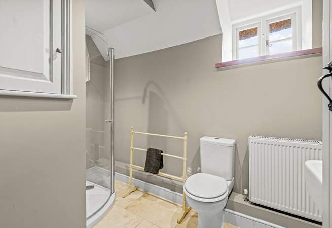 The shower-room is shared by the blue double bedroom and the lower ground floor bedroom.