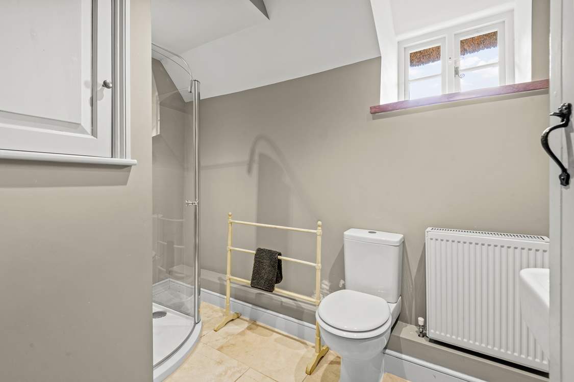The shower-room is shared by the blue double bedroom and the lower ground floor bedroom.