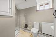 The shower-room is shared by the blue double bedroom and the lower ground floor bedroom.