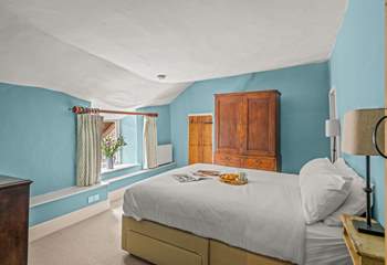 This double bedroom has access to the landing with the family bathroom as well as to the shower-room on the other side. The ceiling is part of the amazing character of this farmhouse!