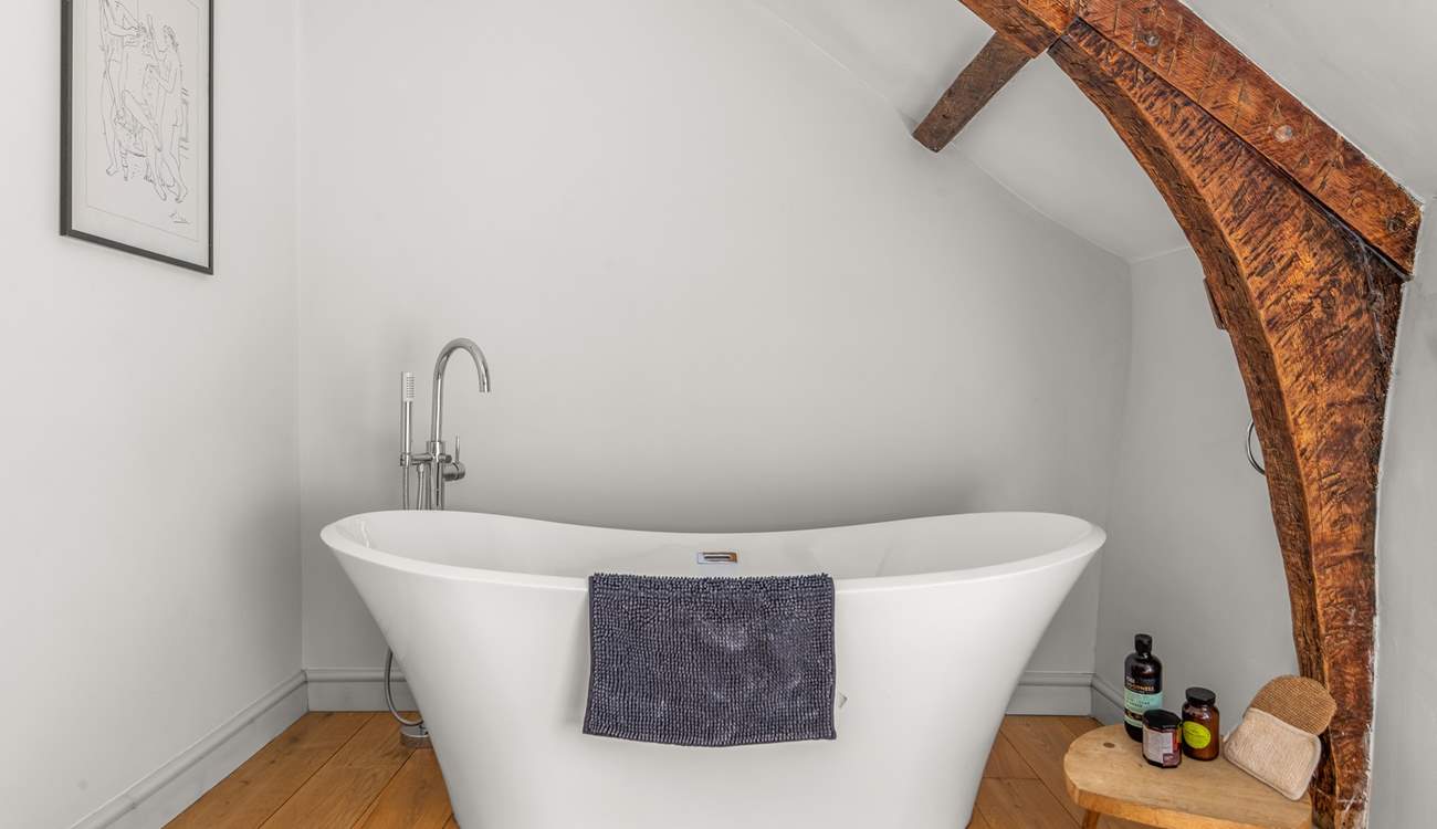 The very stylish family bathroom (the bath is up one step from the rest of the bathroom) is a brand new addition to the farmhouse.