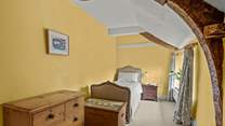 This lovely single bedroom looks out to the front of the farmhouse. The family bathroom is across the corridor.