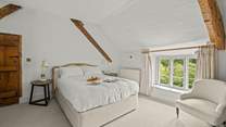 This is the main bedroom at the top of the stairs from the sitting-room.