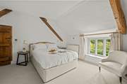 This is the master bedroom at the top of the stairs from the sitting-room.