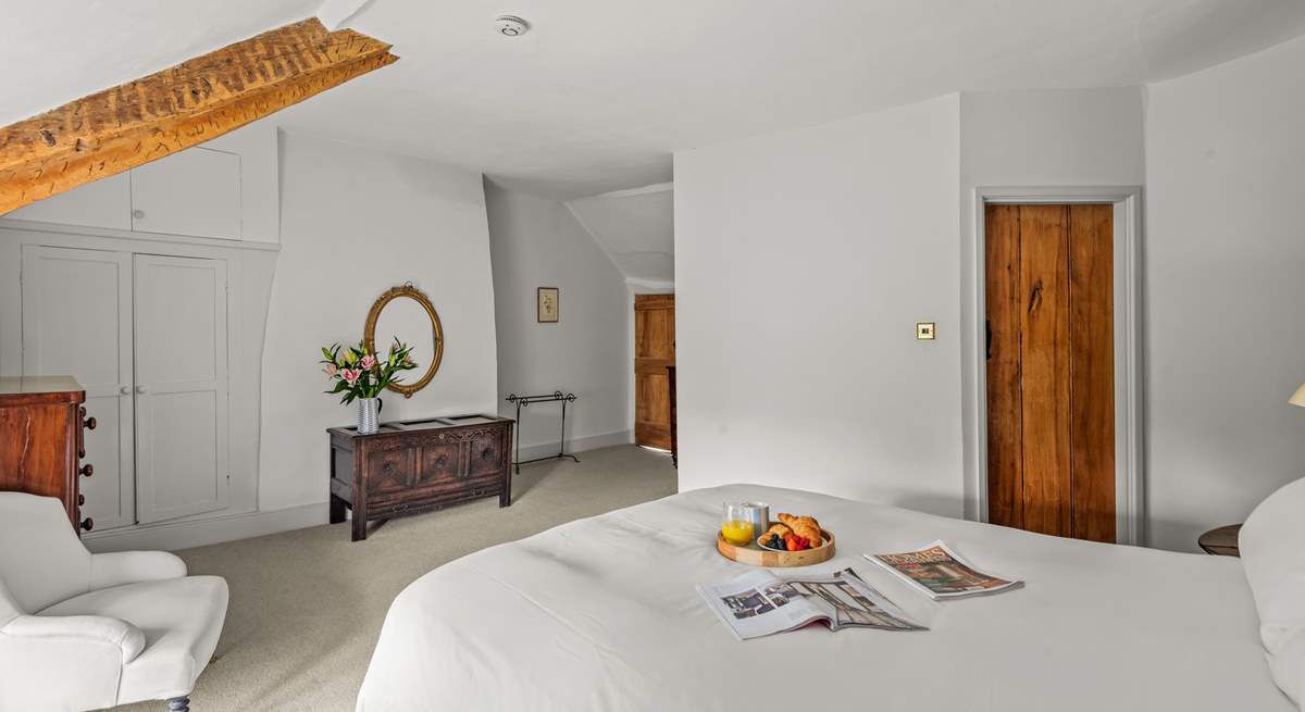 There are some lovely pieces of antique furniture that add to the character of this happy family holiday home.