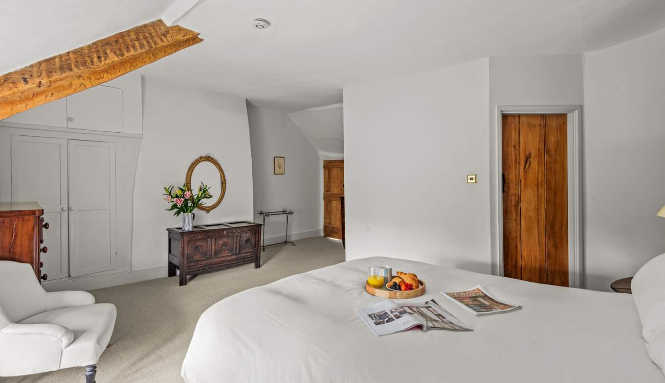 There are some lovely pieces of antique furniture that add to the character of this happy family holiday home.