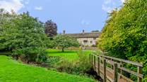 As well as the gardens around the farmhouse there is a small meadow and a little bridge over the river (please supervise children at all times).