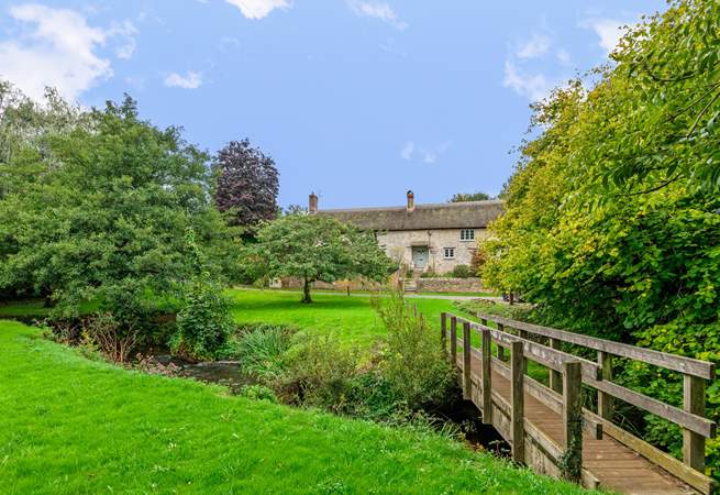 As well as the gardens around the farmhouse there is a small meadow and a little bridge over the river (please supervise children at all times).