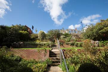 Please note that there are a number of steps up to the house from the parking space.
