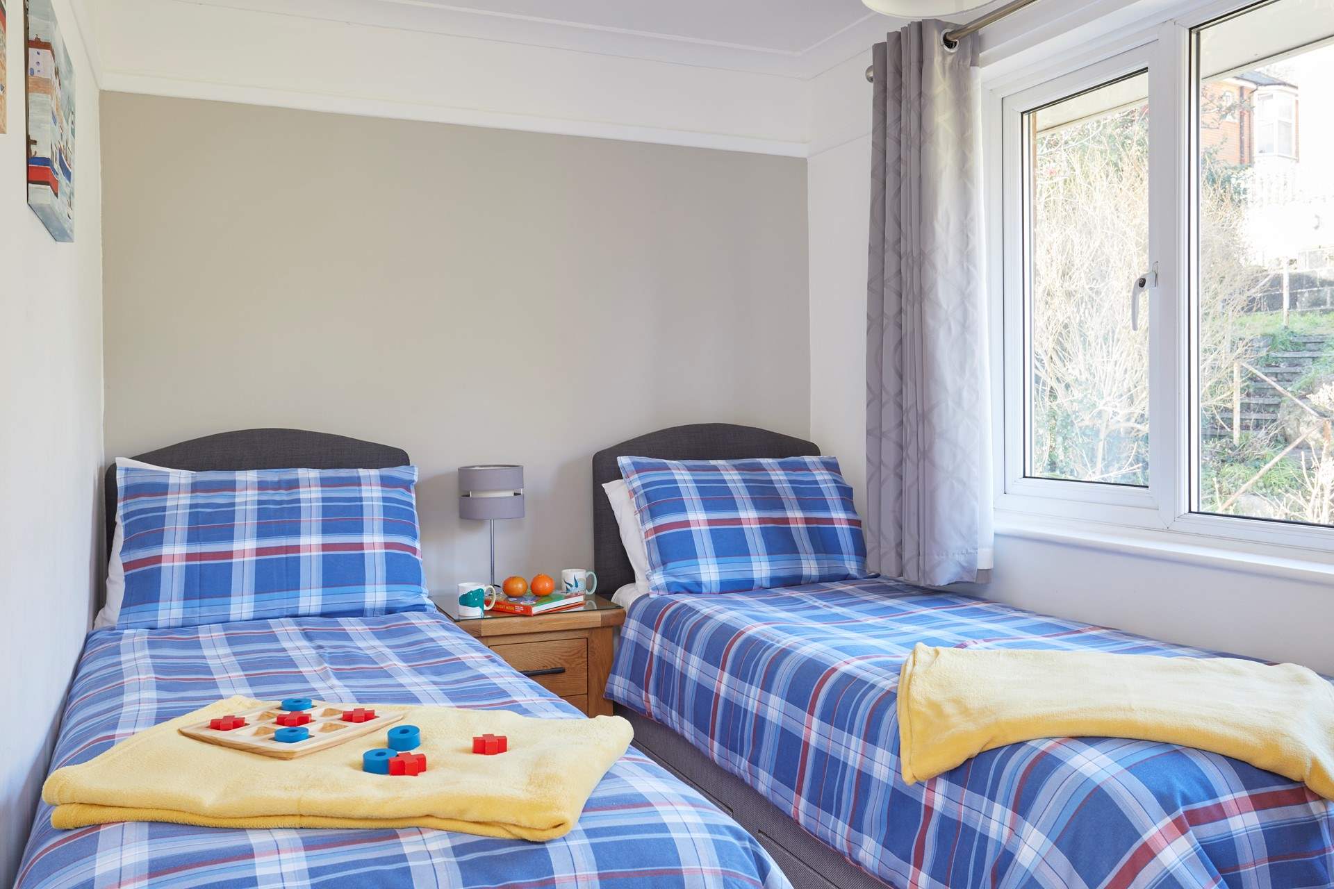 The first twin bedroom faces the front of the house.  A game of tic-tac-toe anyone?