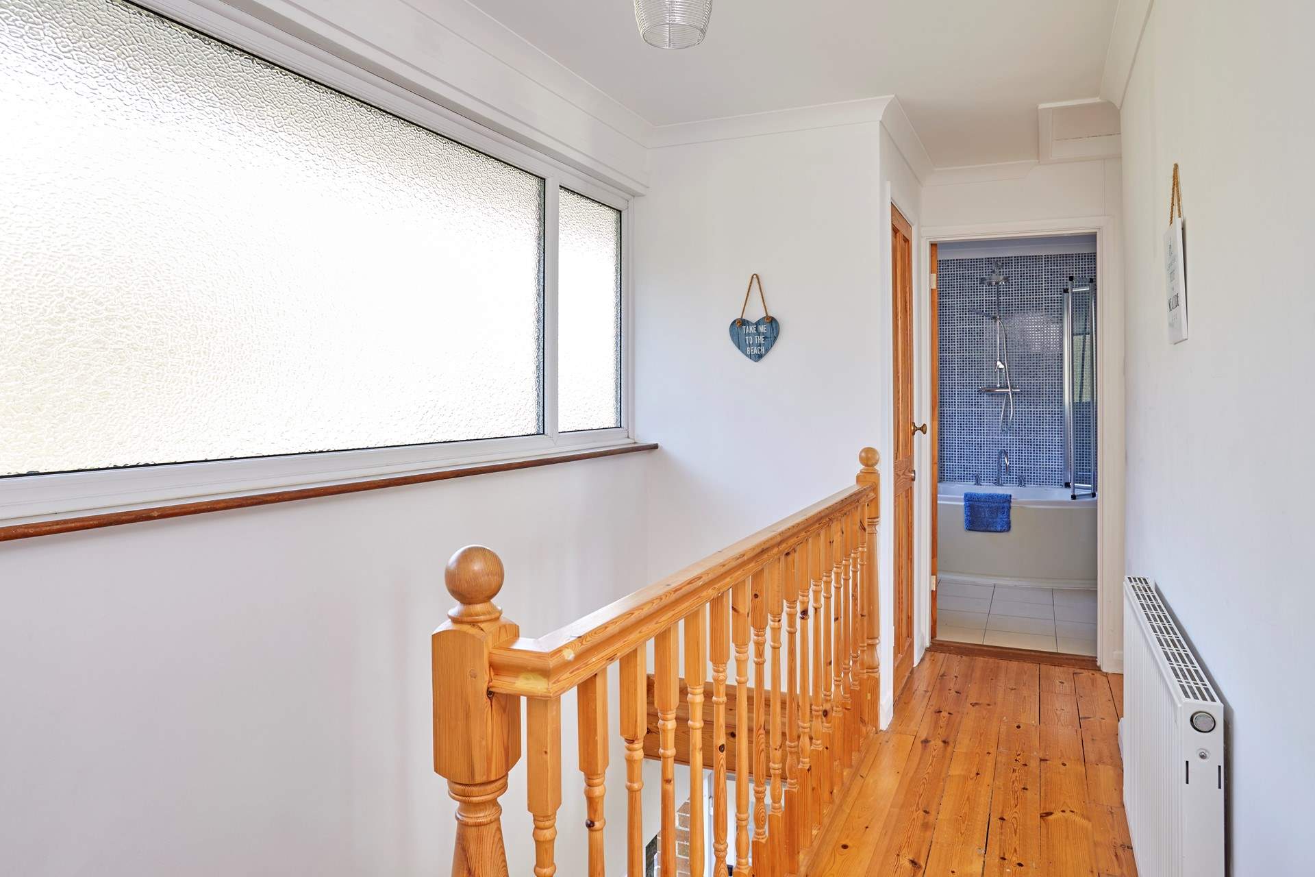 First floor landing facing the family bathroom.