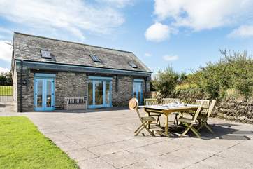 Plenty of room on the terrace to enjoy meals in the open air.