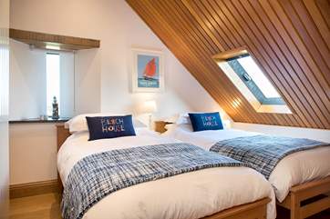 The three bedrooms adopt a nautical theme. All three sit under the eaves so please mind your head.