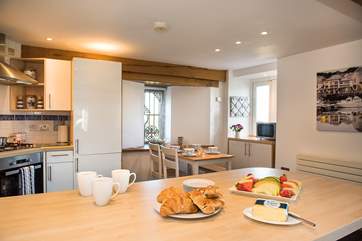 You can perch at the breakfast-bar or eat at the dining-table.